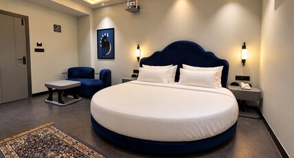 Hotel Nova Ways Room Type - Premium Round Bed Suite with Xclusive Lounge Sofa and Projector Screen \ 50 Inch Smart Web O.s. T.v