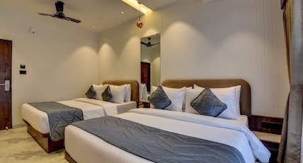 Hotel Orchid by Marigold, Shirdi - Premium Comfort Near Sai Baba Temple Room Type - Orchid Family Room Hotel Orchid by Marigold, Shirdi - Premium Comfort Near Sai Baba Temple Room Type - Orchid Family Room