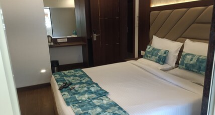 Hotel Dakshin Grandeur Room Type - CLASSIC ROOM Hotel Dakshin Grandeur Room Type - CLASSIC ROOM