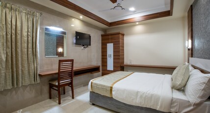 Hotel Raghavendra Room Type - Deluxe Double Room with Balcony