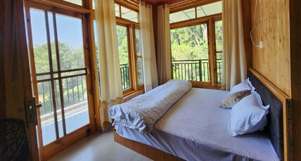 River View Villa A Boutique Stay Room Type - Deluxe room with pool view and balcony AC