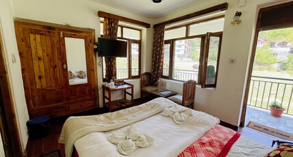 Tourist Hotel (10 Mins Walking from Mall), Manali Room Type - Compact Standard Double Bedroom with mountain view Tourist Hotel (10 Mins Walking from Mall), Manali Room Type - Compact Standard Double Bedroom with mountain view
