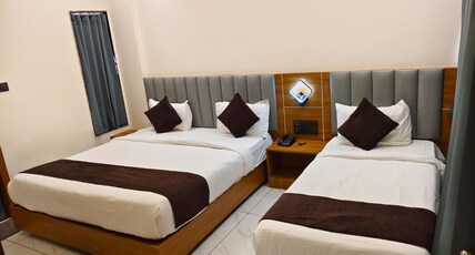 Hotel Krishnay Somnath bypass Room Type - EXECUTIVE TRIPLE BED