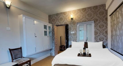 Hotel Kurmanchal(walkable distance from Mall Road) Room Type - Family Room Hotel Kurmanchal(walkable distance from Mall Road) Room Type - Family Room