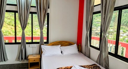 lhamu homestay Room Type - super deluxe room with mountain & balcony view