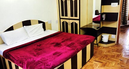 Shashwat deluxe rooms Room Type - Bedroom 1