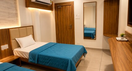 HOTEL MIDTOWN AC AND NON AC ROOMS Room Type - Deluxe Non AC room HOTEL MIDTOWN AC AND NON AC ROOMS Room Type - Deluxe Non AC room
