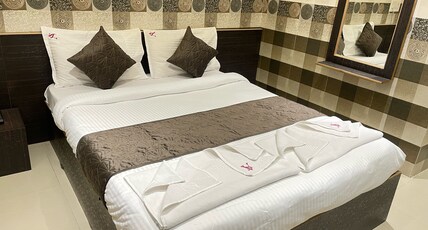 ADDHURI COMFORTS INN Room Type - Deluxe AC Room