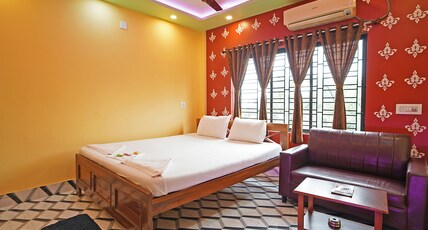 Whispering Woods Inn Room Type - AC Super Deluxe Room