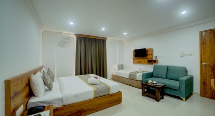 Fly Inn Room Type - Family Room With One King and One Single Bed