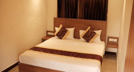 HOTEL SANGAMAM Room Type - DELUXE Room