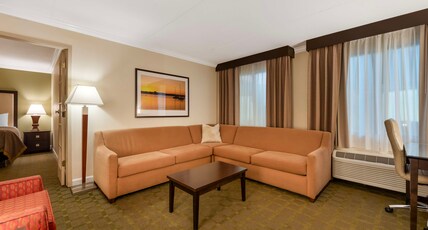 Best Western Plus White Bear Country Inn Room Type - Suite-1 King Bed, Non-Smoking, 2 Rooms, Separate Sitting Area With Sofabed, Two Flat Screen Televisi Best Western Plus White Bear Country Inn Room Type - Suite-1 King Bed, Non-Smoking, 2 Rooms, Separate Sitting Area With Sofabed, Two Flat Screen Televisi