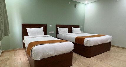 Raasaa Grand Rooms Room Type - Deluxe Triple Non-AC Room