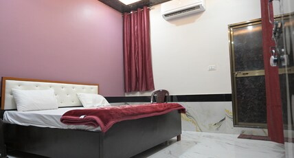 PREKSHA PALACE Room Type - Deluxe Room