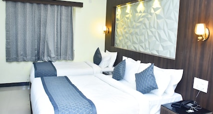 Hotel La Gowri Coorg Room Type - DELUXE TRIPLE ROOM - AC Hotel La Gowri Coorg Room Type - DELUXE TRIPLE ROOM - AC