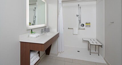 Holiday Inn Express Hotel & Suites SeaTac Room Type - 1 King Standard Mobil Access Roll Shower Holiday Inn Express Hotel & Suites SeaTac Room Type - 1 King Standard Mobil Access Roll Shower