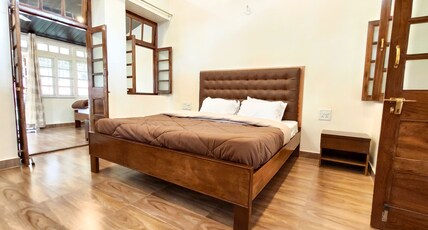 Citadel Resort Room Type - Family Super Deluxe (AC) suite with Private Lawn and Veranda with 1 King Bed and 2 Single Beds Citadel Resort Room Type - Family Super Deluxe (AC) suite with Private Lawn and Veranda with 1 King Bed and 2 Single Beds