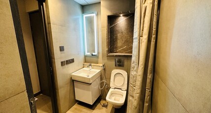 Aura Stays - Supernova  Room Type - High Rise Haven  32nd Floor