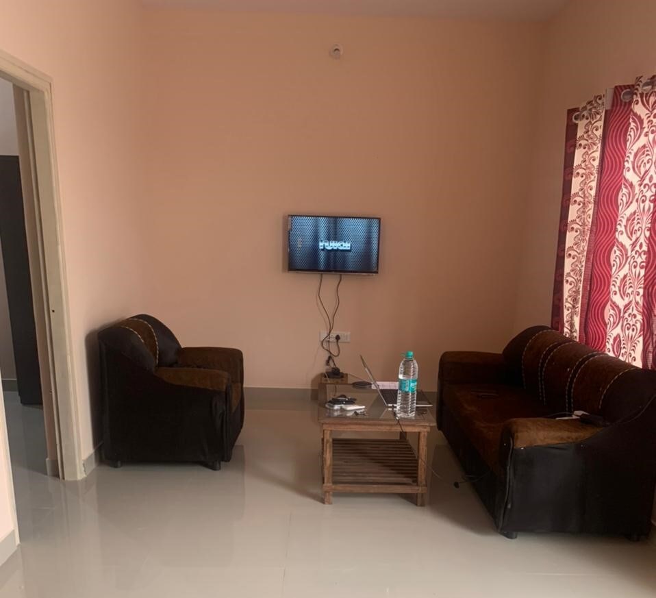 EasyNest Service Apartment - Tap to explore photos