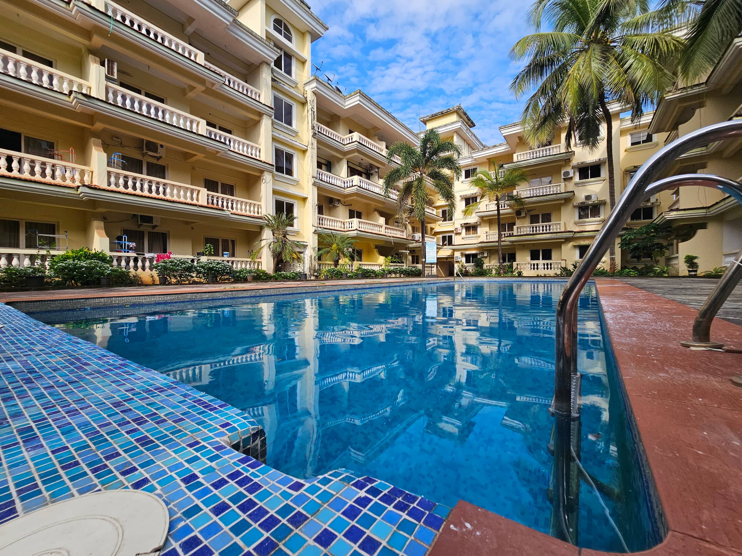 Seashell Serenity Poolside 2BHK Retreat - Tap to explore photos