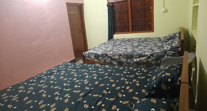 Sadhu Inn Room Type - Four bedded non AC room with shared bathroom