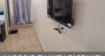 HOTEL VAAMANA STAYS Room Type - Standard AC Room