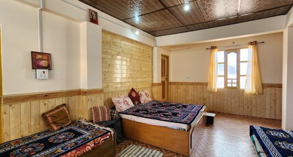 Buddha Homestay Kaza Room Type - King family room