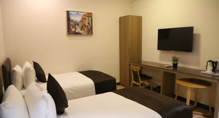 HOTEL SEASONS COMFORT Room Type - Premium Corporate Twin Bed Ac