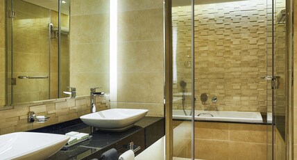 Mercure Dubai Barsha Heights Hotel Suites And Apartments Room Type - Prestige Suite, Two Bedrooms with a king size bed and 2 single beds, City View