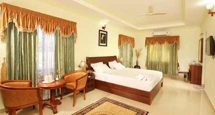 Hotel Chithrapuri Room Type - AC Deluxe