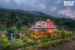 Photos of StayVista at Feel Good Farm Stay