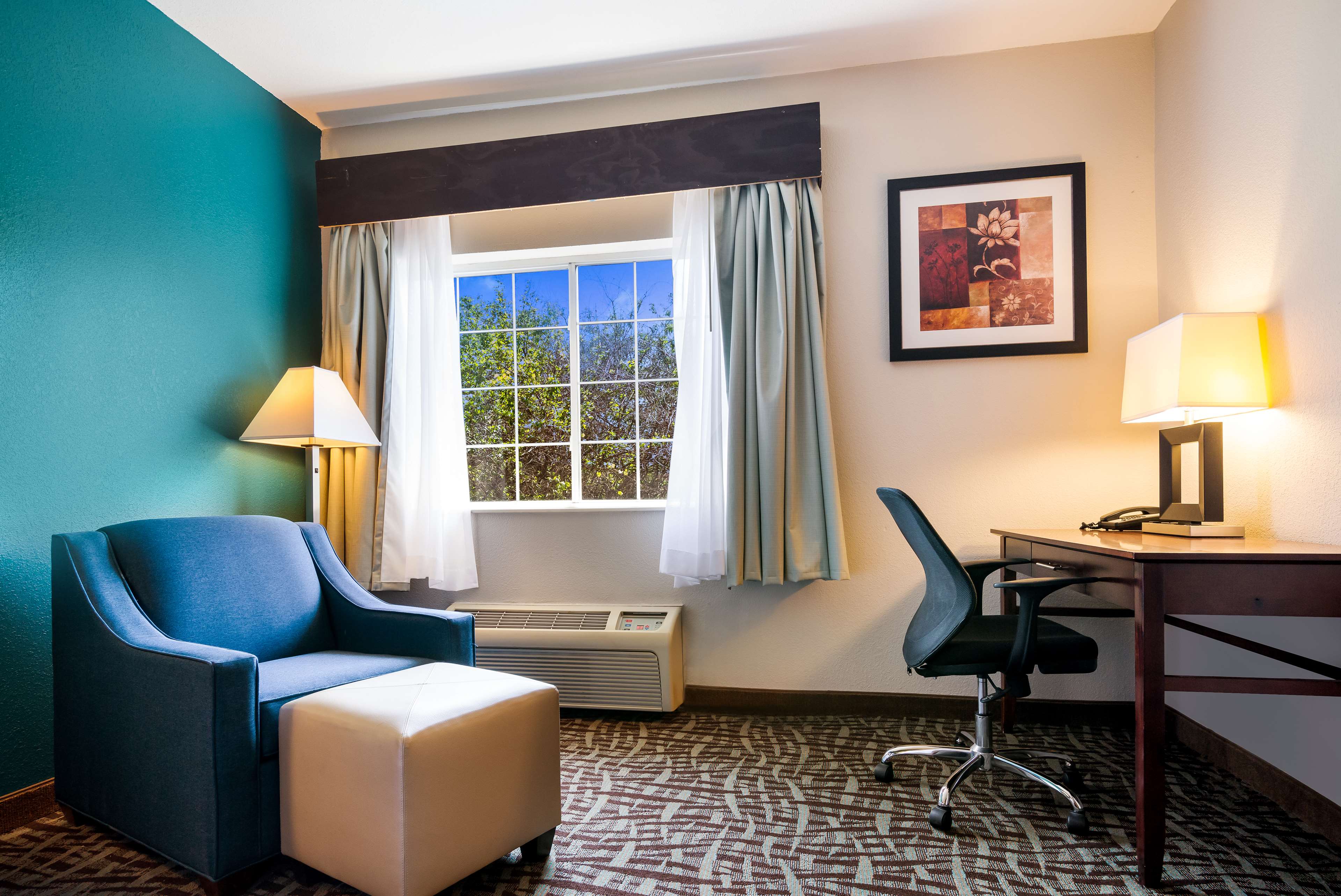 SureStay Plus Hotel by Best Western Topeka Northwest - Tap to explore photos