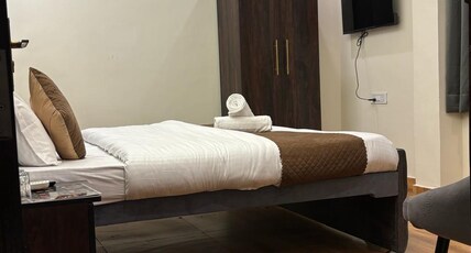 AKS Grand Hotel in Varanasi Room Type - Deluxe Non-AC Room - 301