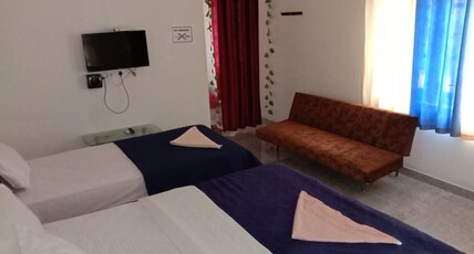 Shivalaya estatestay Room Type - Deluxe Room-Spacious