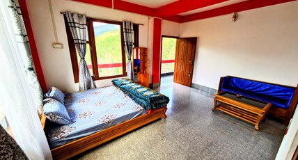 KUNJANG HOMESTAY Room Type - DOUBLE BED DELUXE ROOM