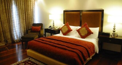 The Lalit Ashok Bangalore Room Type - Presidential Suite King size bed Jacuzzi Sitout Separate Dinning Area