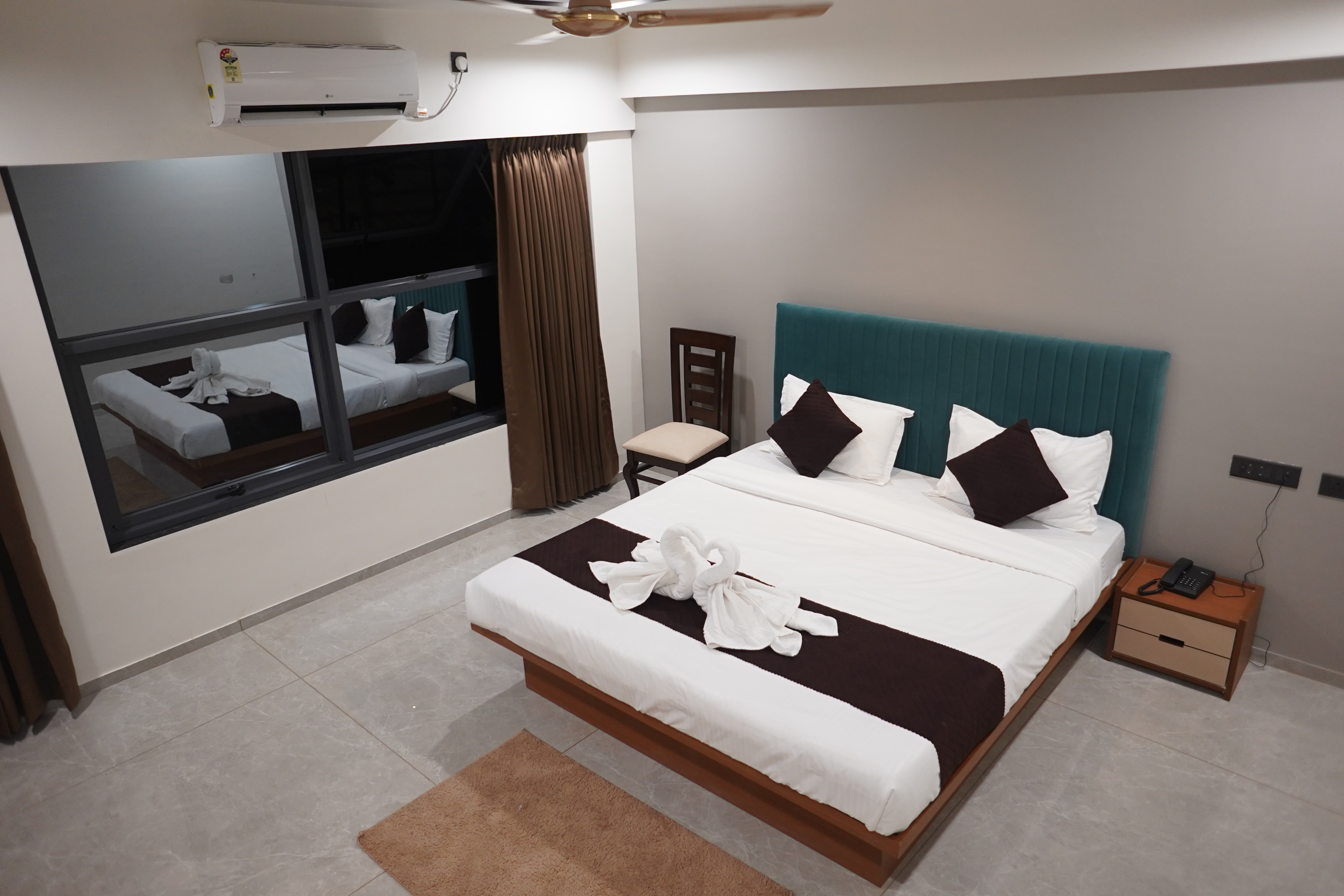 Hotel New Moshi Grrand - Tap to explore photos