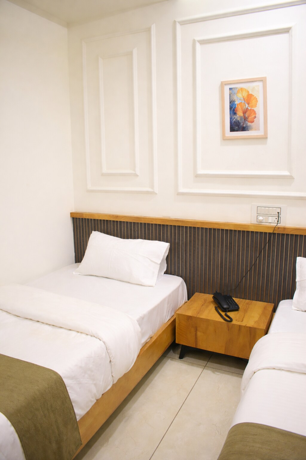 Hotel Raw Leaves Premium Family & Business Hotel Near Rajkot Railway Station - Tap to explore photos