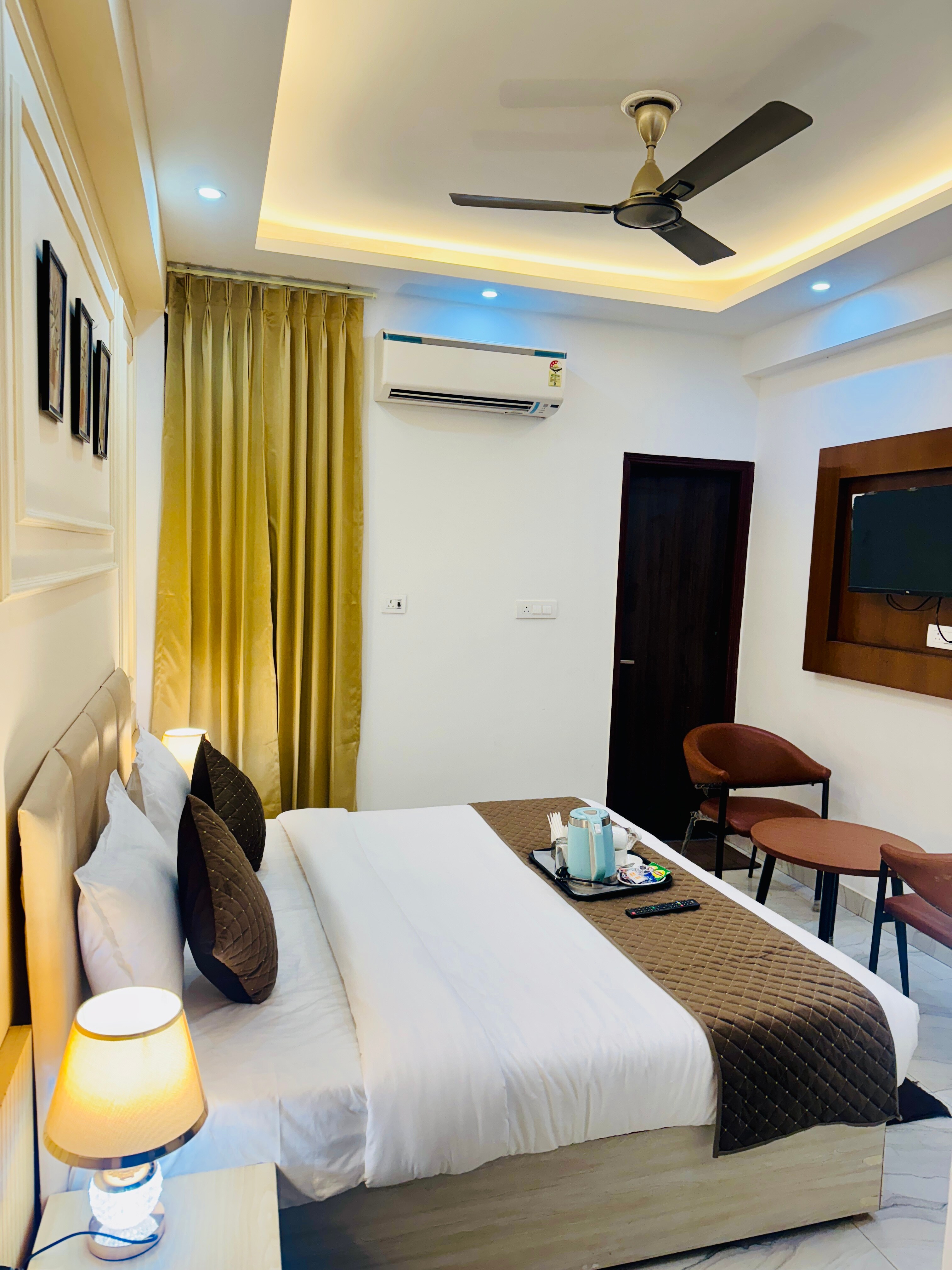 Hotel Classic Crowne Near Yashobhoomi Centre Dwarka - Tap to explore photos