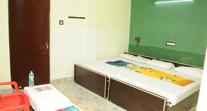 K J Lodge Room Type - Triple Bed AC Room