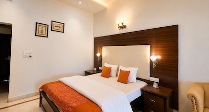 Hotel Rajhans Room Type - Pinjore Suite with Bathtub & Balcony Hotel Rajhans Room Type - Pinjore Suite with Bathtub & Balcony