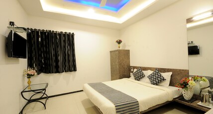Hotel Vyankatesh (Pure Veg Restaurant) Room Type - Super Deluxe Room AC - Stilt Floor Base pax for 2 Hotel Vyankatesh (Pure Veg Restaurant) Room Type - Super Deluxe Room AC - Stilt Floor Base pax for 2