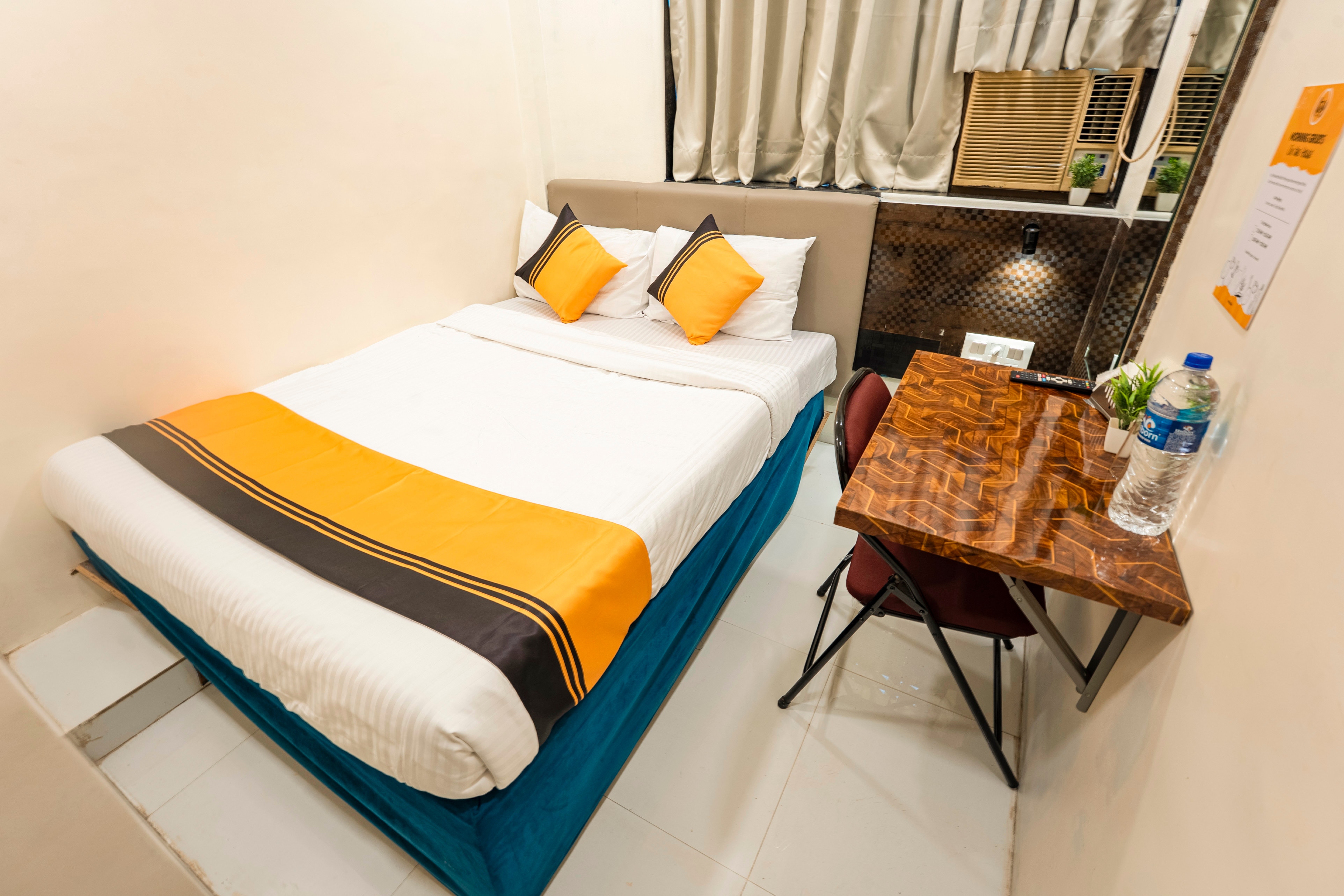 Itsy Hotels Bindra Elite - Tap to explore photos
