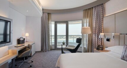 Pearl Rotana Capital Centre Room Type - Large Corner Room - King Bed