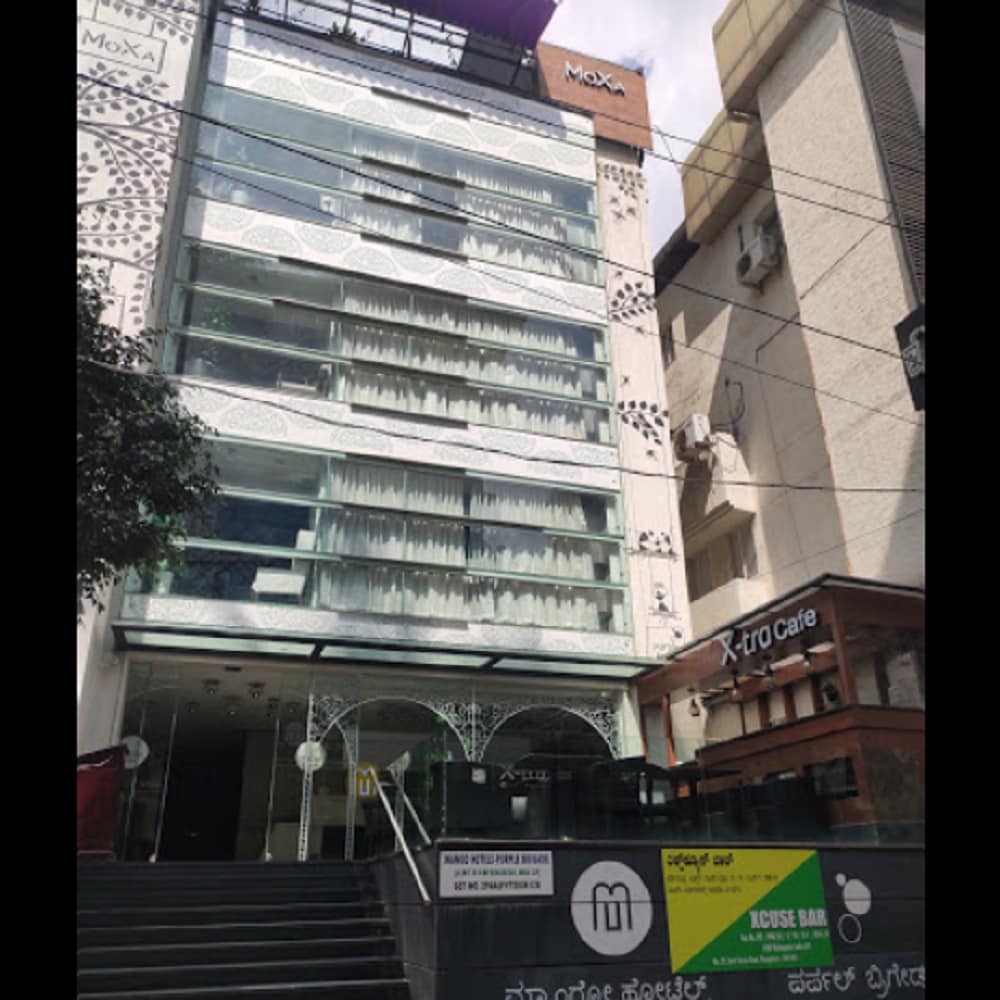 Purple Brigade Hotel - Tap to explore photos