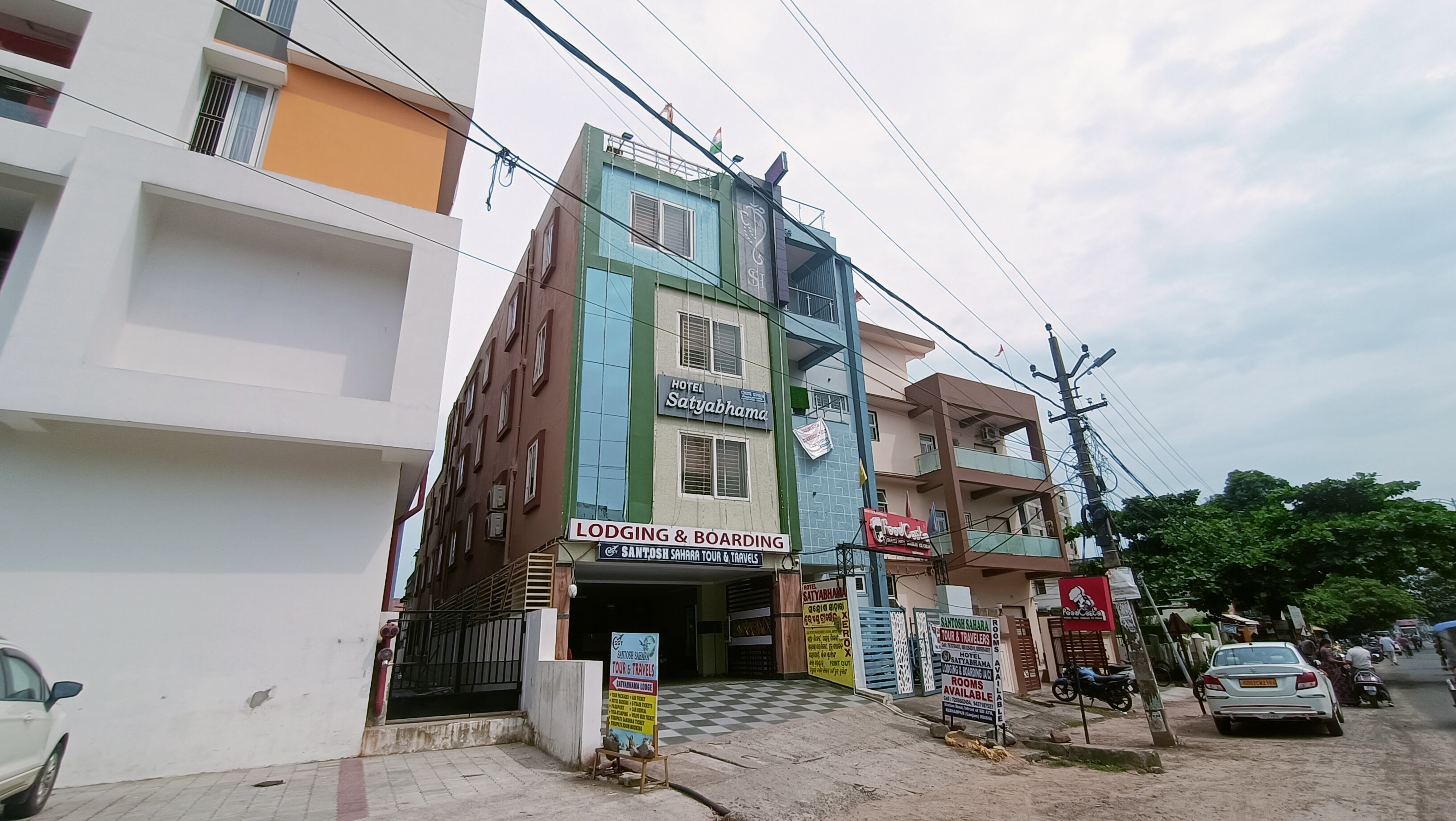HOTEL SATYABHAMA - Tap to explore photos