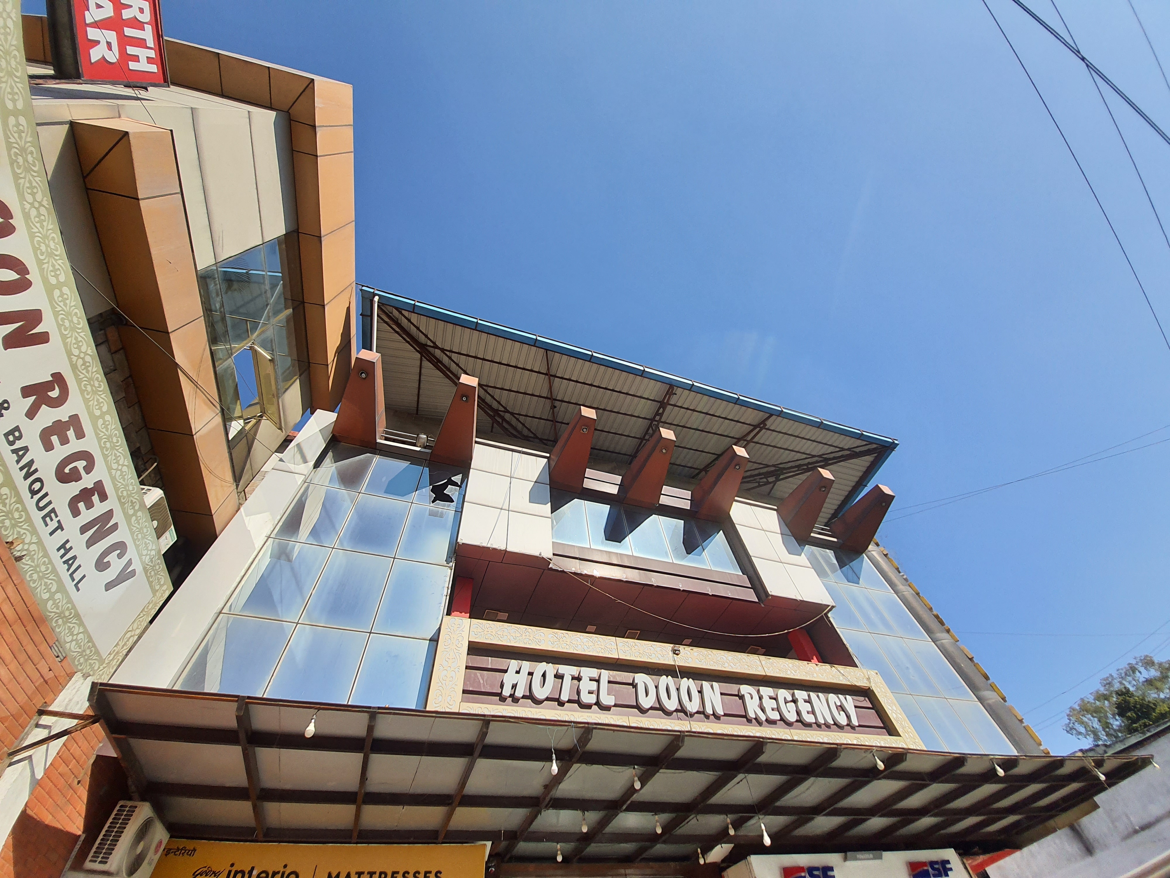 Hotel Doon Regency - Tap to explore photos