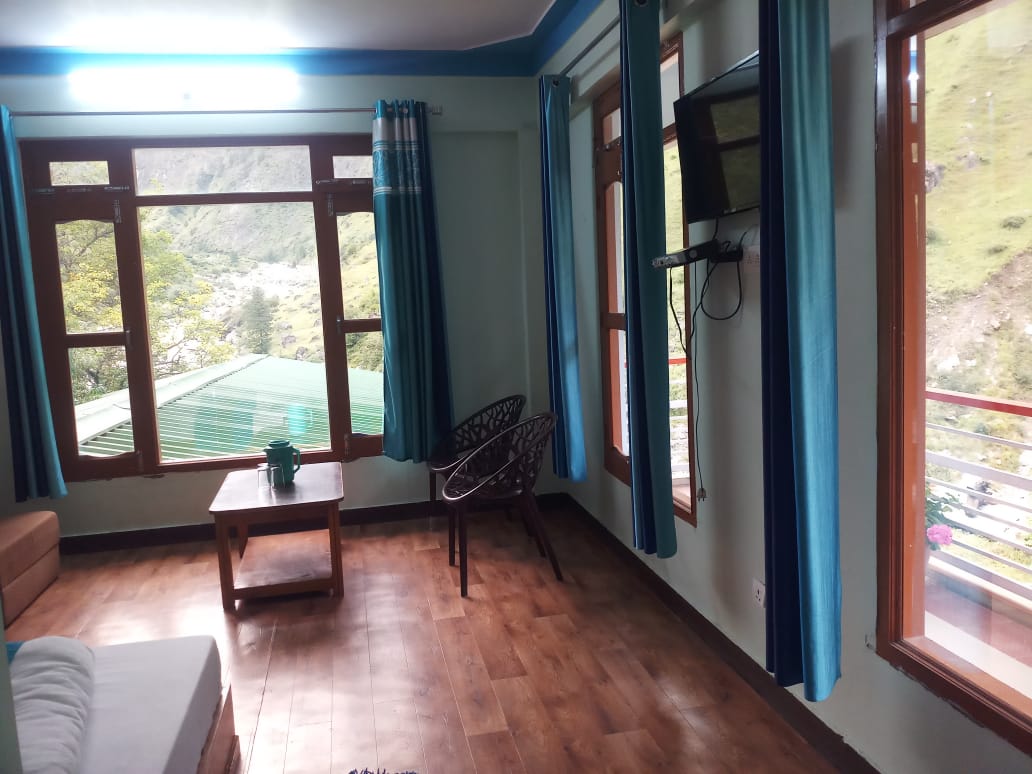 Ganga Resort | Mountain-view Rooms - Tap to explore photos