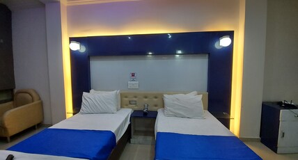 RAVITEJA HOTEL Room Type - AC DELUXE ROOM