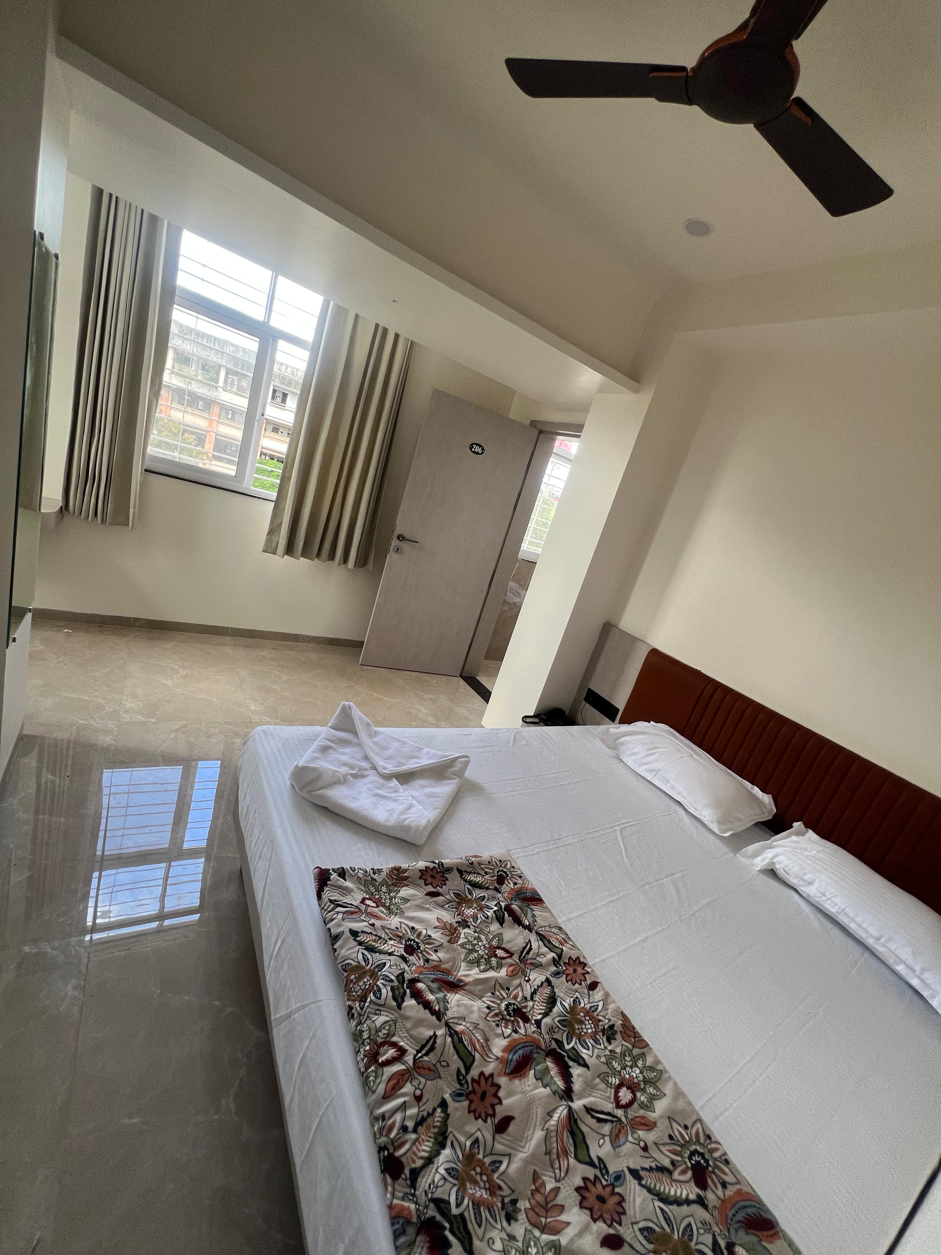 Hotel Radhika Lodging - Tap to explore photos